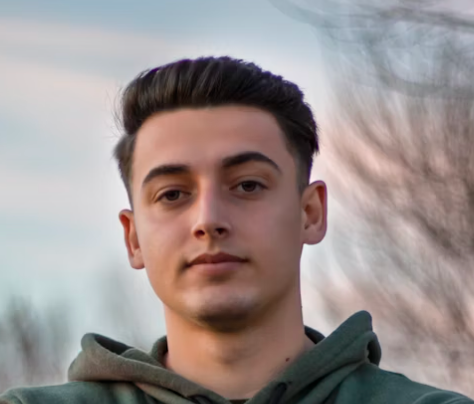 Young man in green hoodie